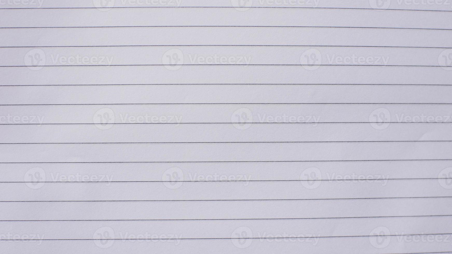 wit vel papier. gelinieerd notebookpapier voor achtergrond foto