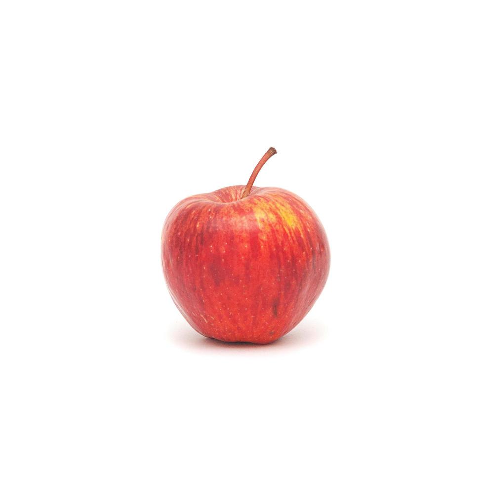 een rode appel geïsoleerd op een witte achtergrond foto