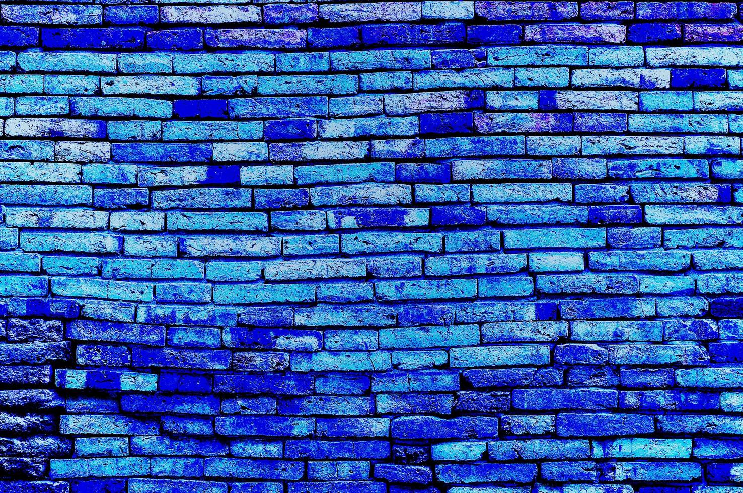 oude bakstenen muur textuur achtergrond in blauwe kleurtoon foto