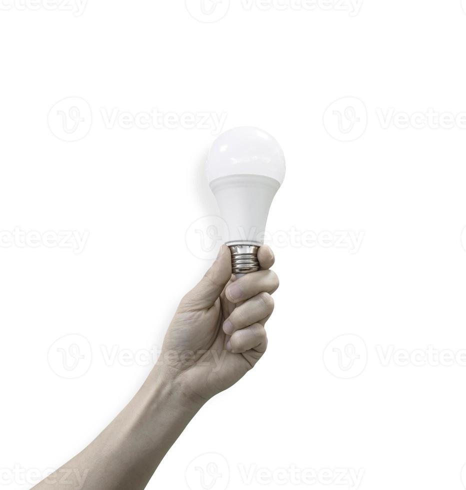 mannelijke hand met een led-lamp geïsoleerd op een witte achtergrond met uitknippad. milieuvriendelijk concept. foto