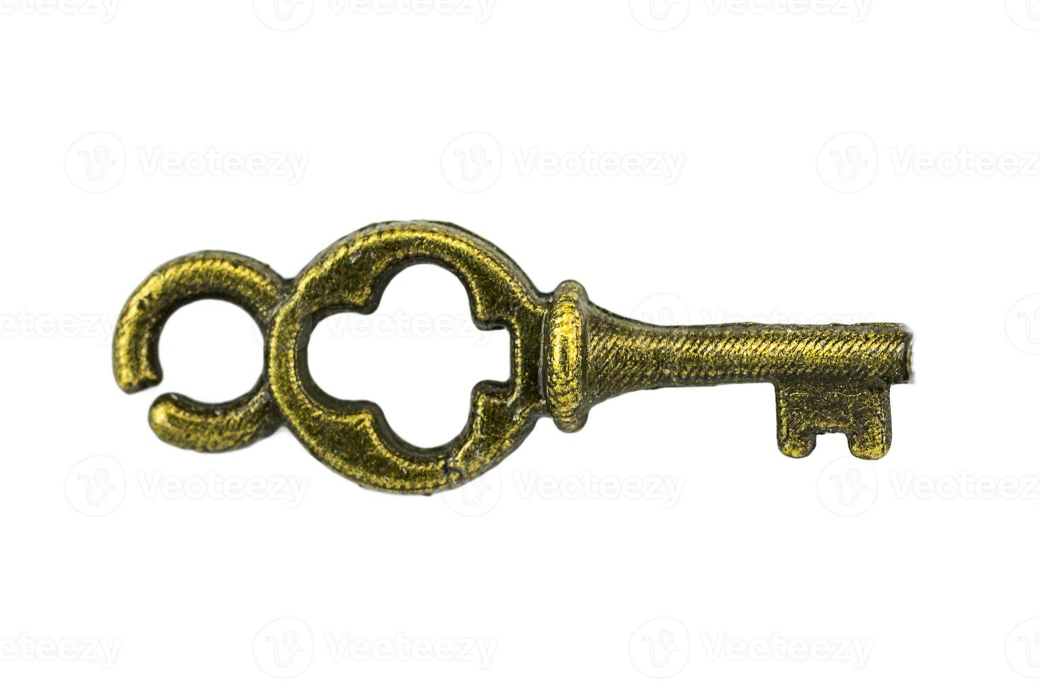 vintage sleutel antieke gouden sleutel op witte achtergrond uitknippad foto