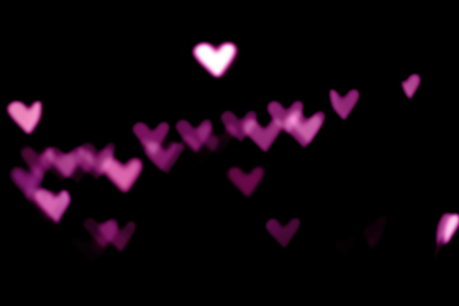 roze bokeh abstracte achtergrond voor liefdesdag foto