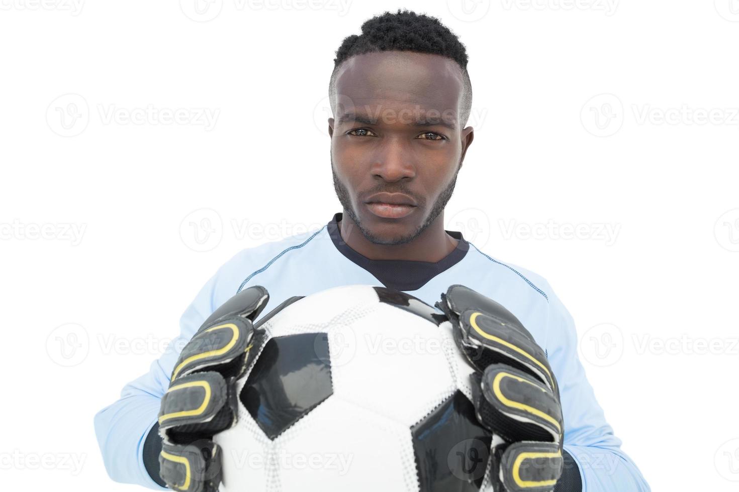 portret van een serieuze voetballer foto