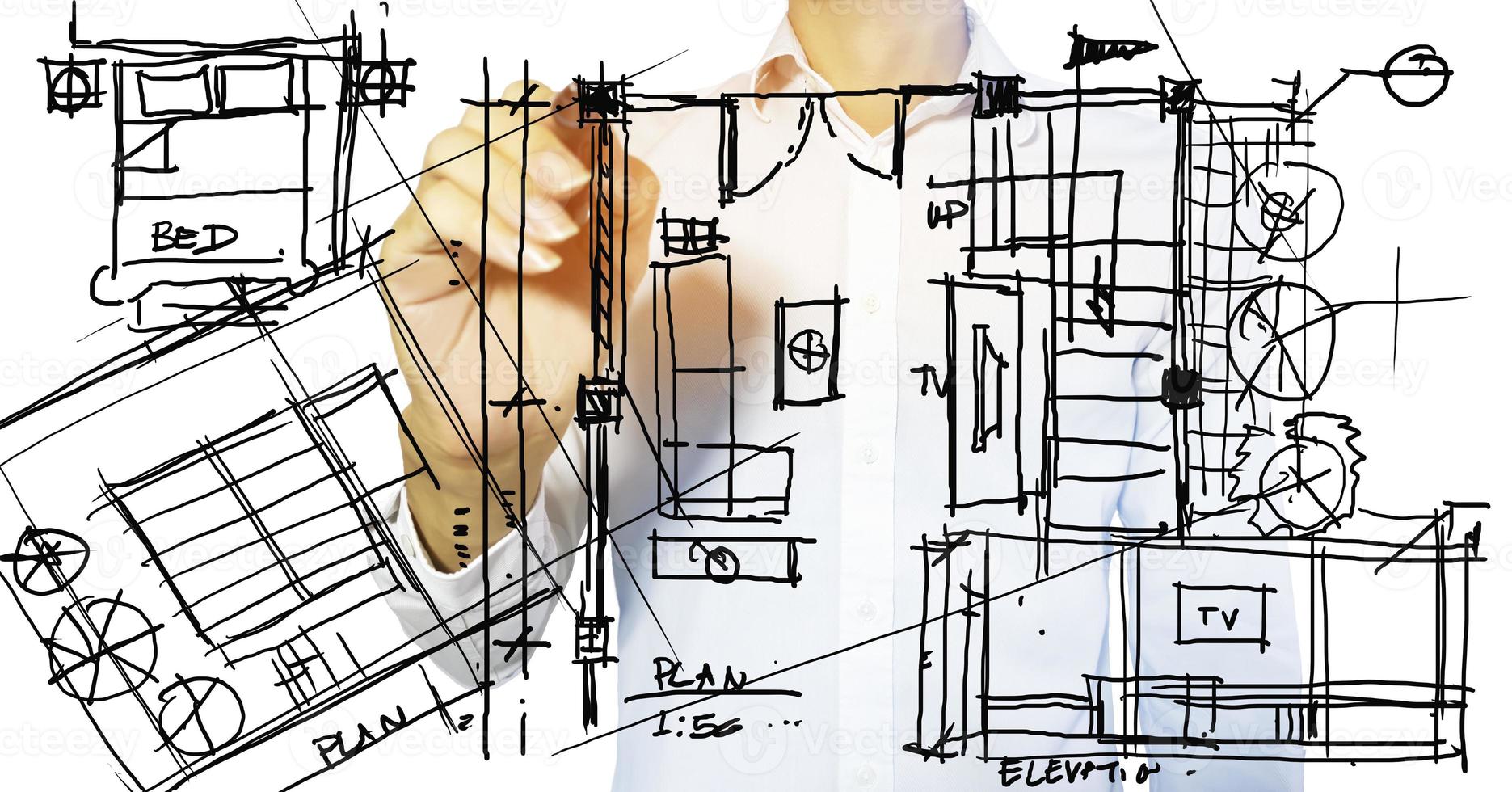 een binnenhuisarchitect tekent een schets van een woonhuisplan., interieurontwerpbedrijf foto