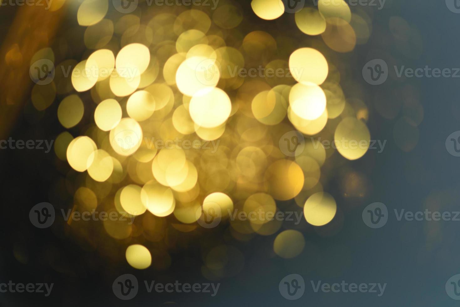 gouden glitter bokeh verlichting textuur wazig abstracte achtergrond voor verjaardag, jubileum, bruiloft, oudejaarsavond of kerst foto