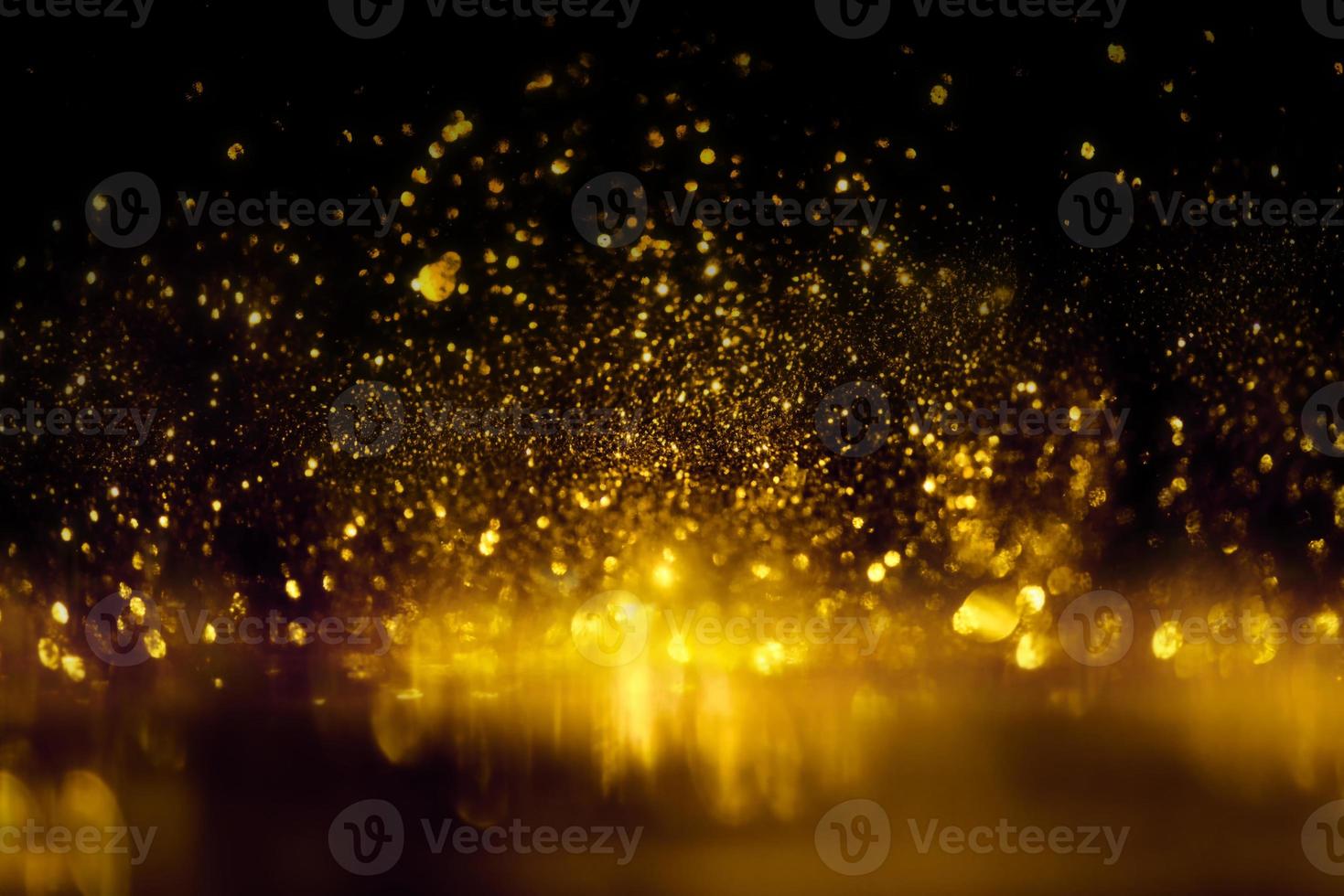 gouden glitter bokeh verlichting textuur wazig abstracte achtergrond voor verjaardag, jubileum, bruiloft, oudejaarsavond of kerst foto