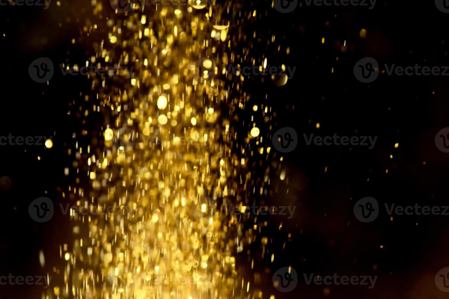 gouden glitter bokeh verlichting textuur wazig abstracte achtergrond voor verjaardag, jubileum, bruiloft, oudejaarsavond of kerst foto