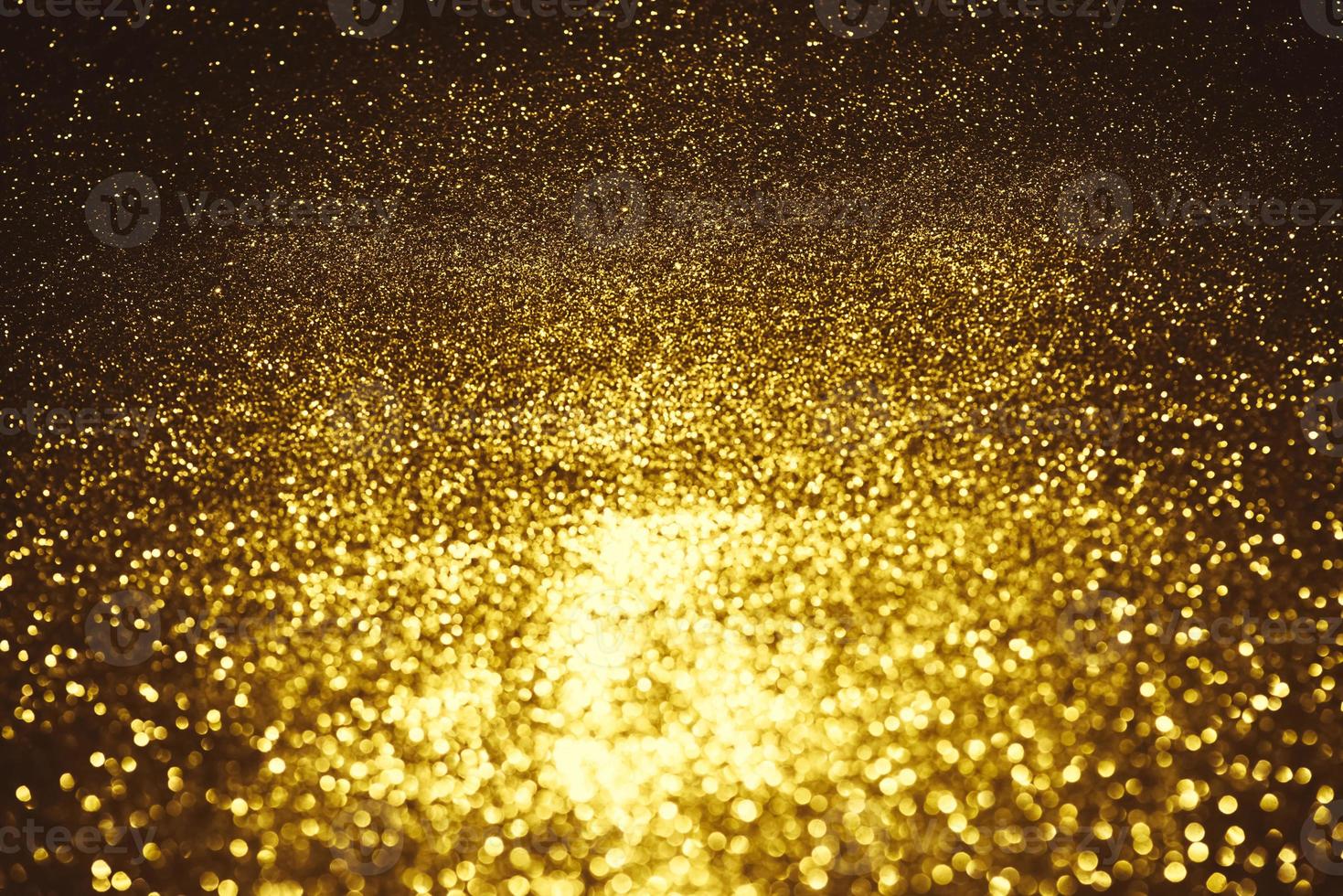 gouden glitter bokeh verlichting textuur wazig abstracte achtergrond voor verjaardag, jubileum, bruiloft, oudejaarsavond of kerst foto