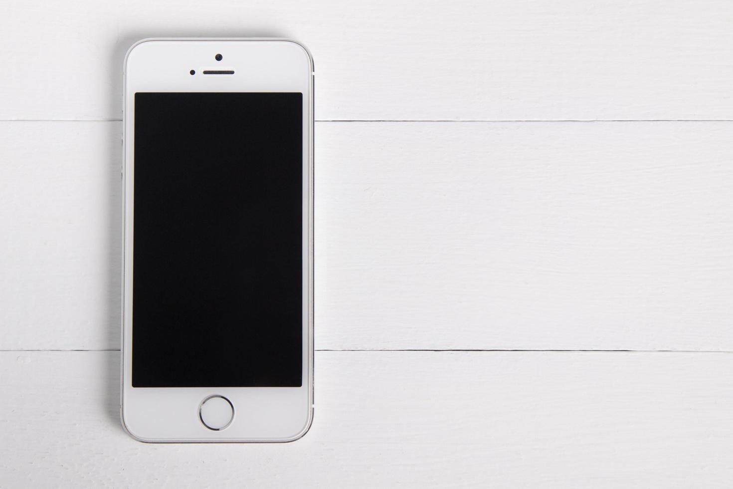 zilver witte iphone 5s. productmodel voor ui, ux-ontwerp, app-presentaties foto