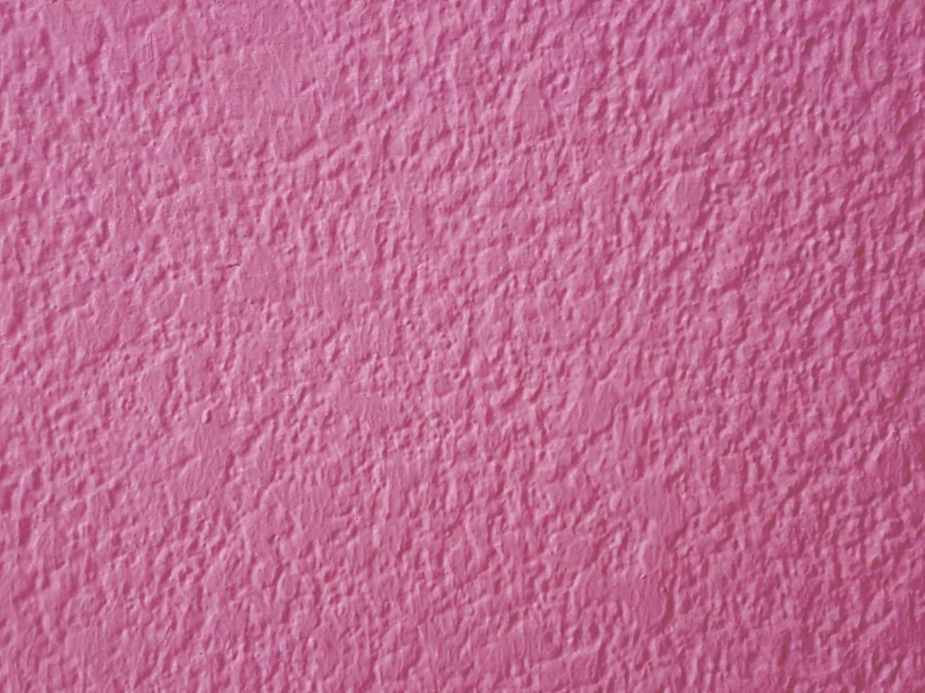 roze muur of papier textuur, abstracte cement oppervlak achtergrond, betonpatroon, geschilderd cement, ideeën grafisch ontwerp voor webdesign of banner foto