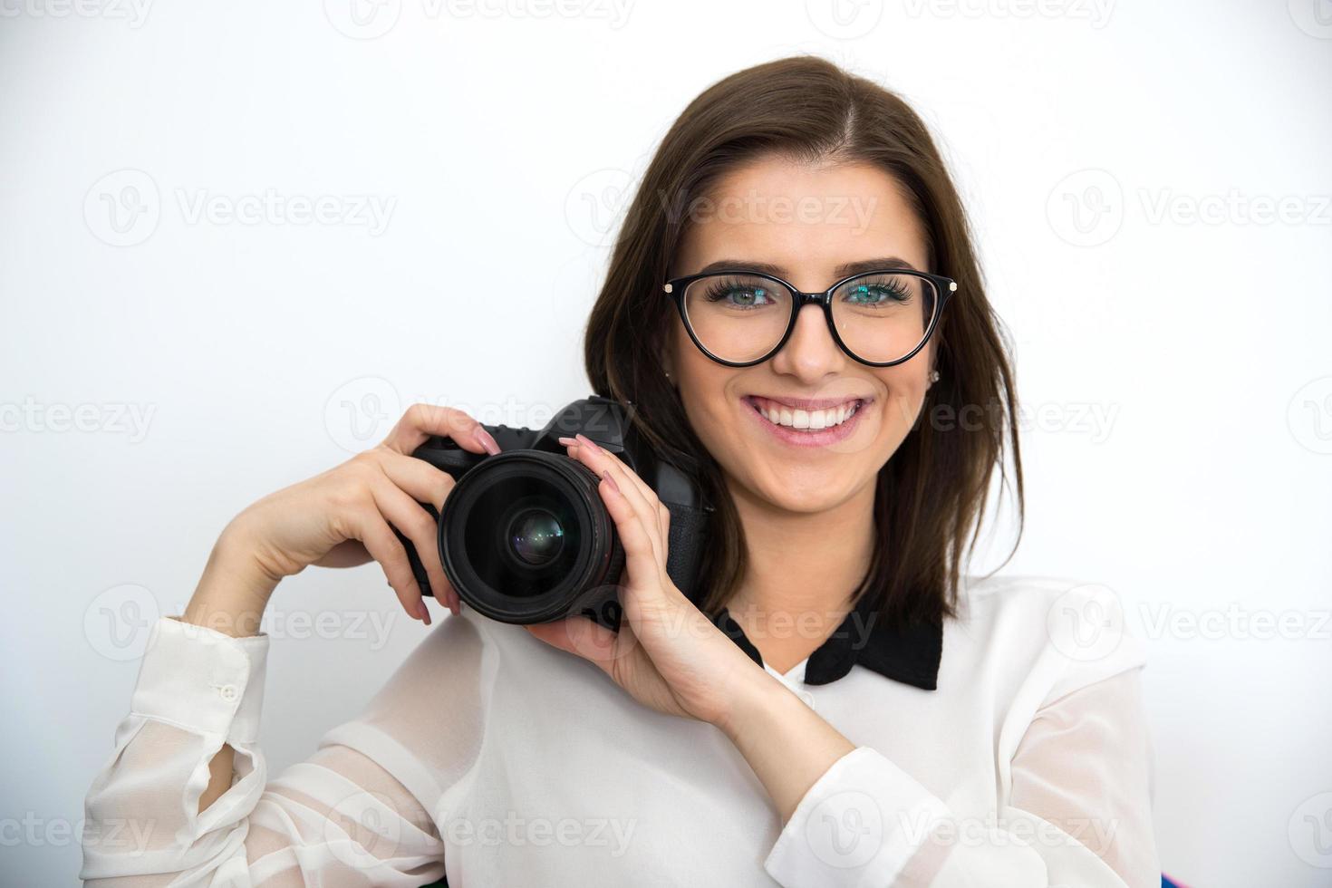 mooie vrouw met camera foto