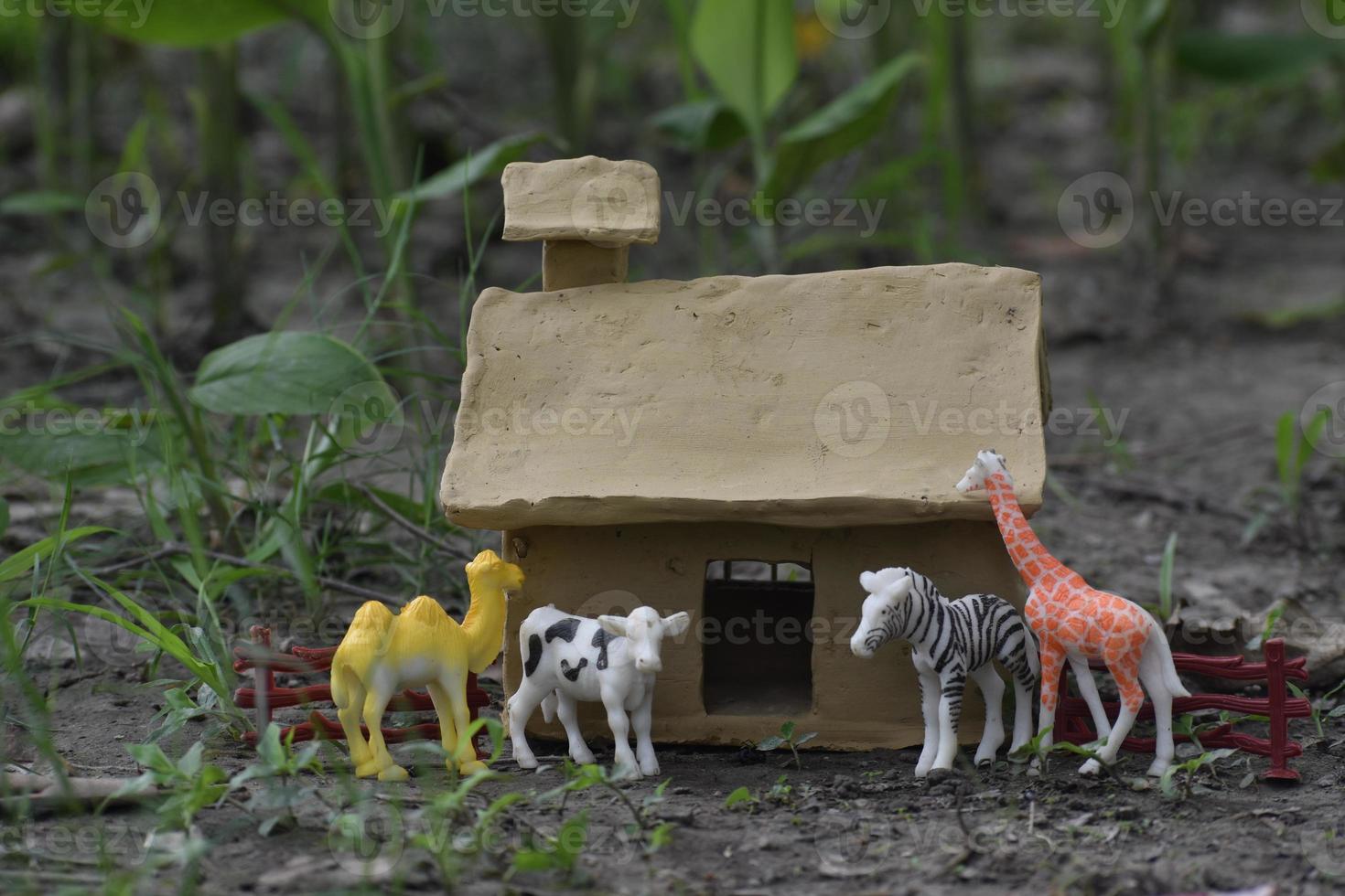 kinderspeelgoed dier met huis foto