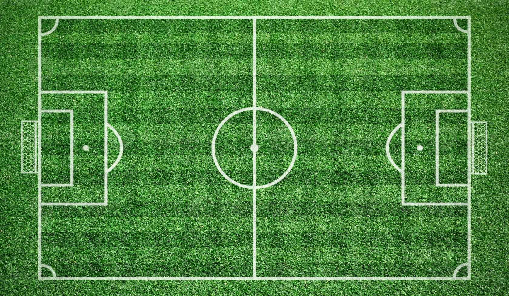 voetbalstadion. bovenaanzicht streep gras voetbalveld. groen gazon met lijnenpatroon voor sportachtergrond. foto