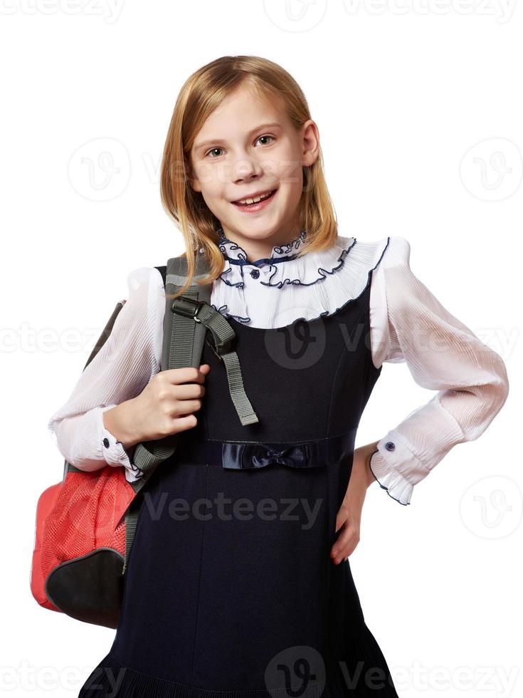 meisje dat zich met geïsoleerde schooltas bevindt foto