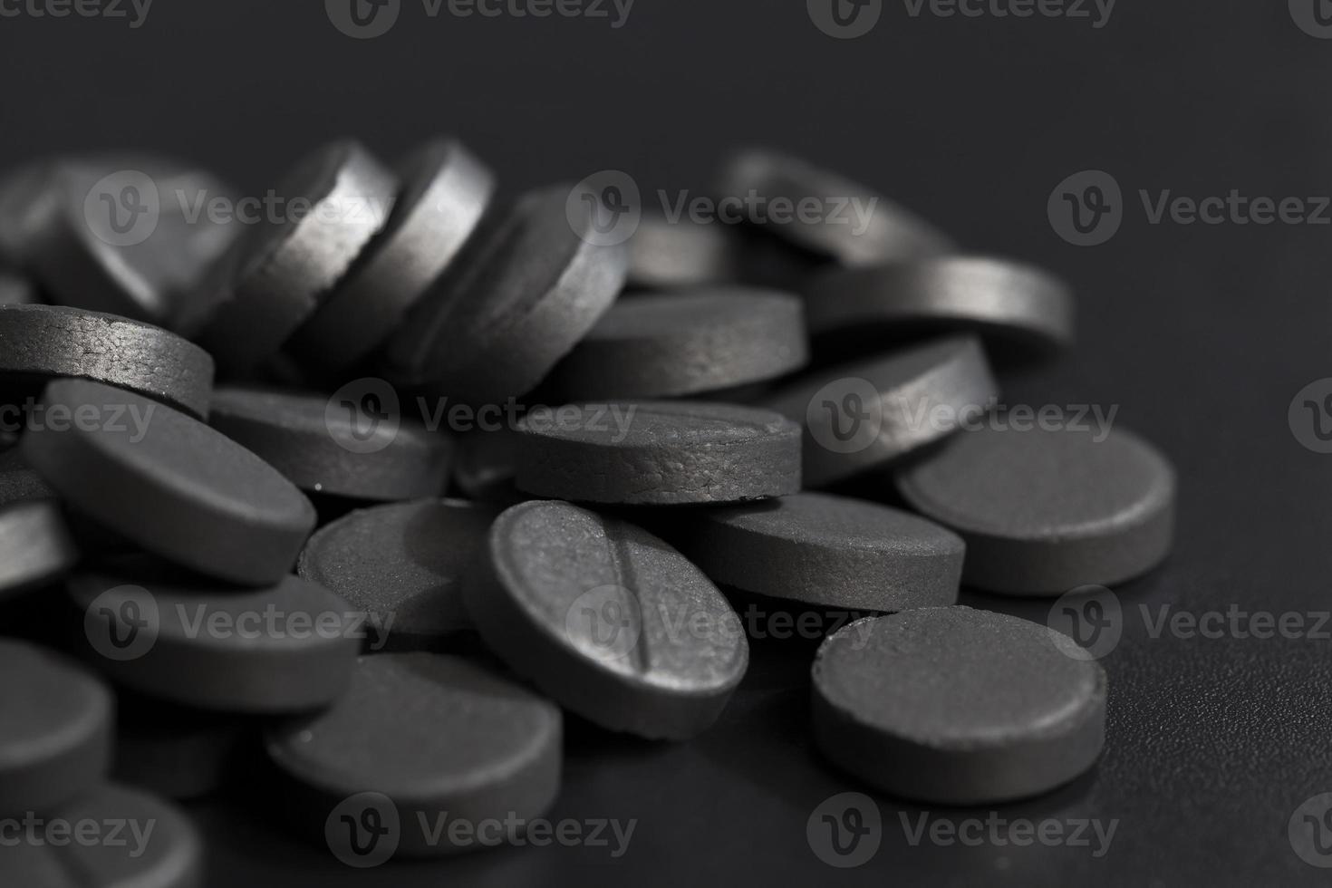 zwarte tabletten, close-up foto