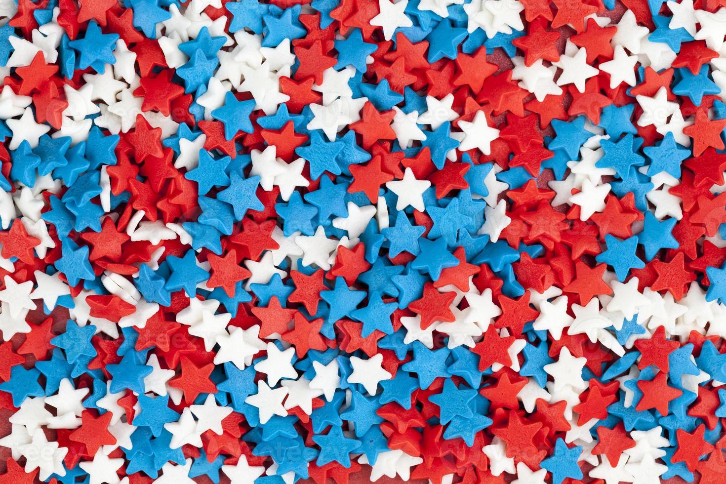 rode, blauwe en witte stervormige snoepjes foto