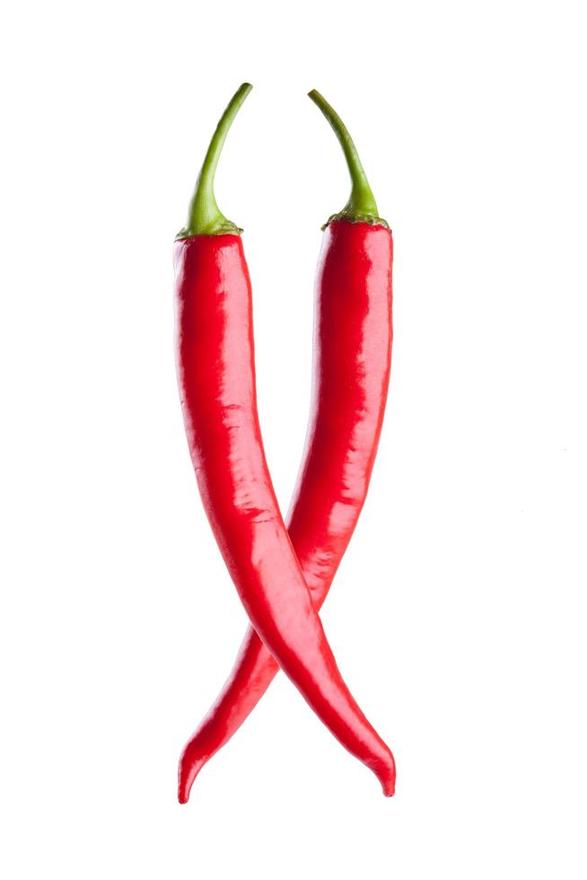 rode chili of chili cayenne peper geïsoleerd op een witte achtergrond foto