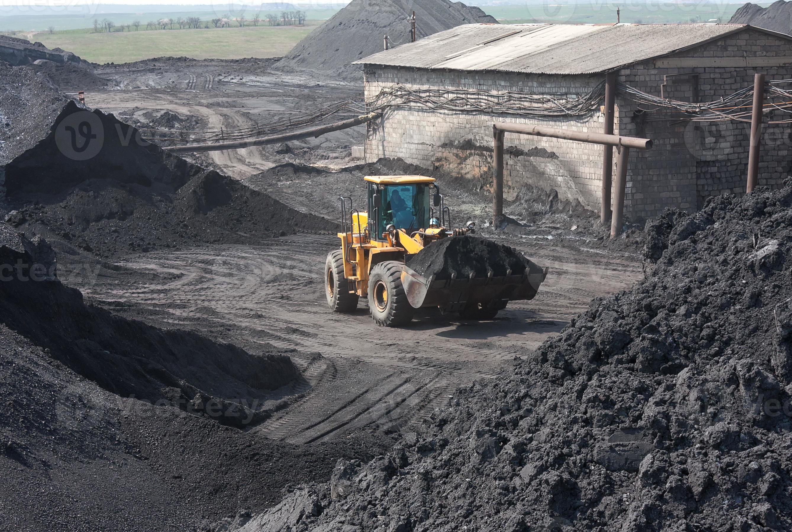 wiellader machine kolen laden foto