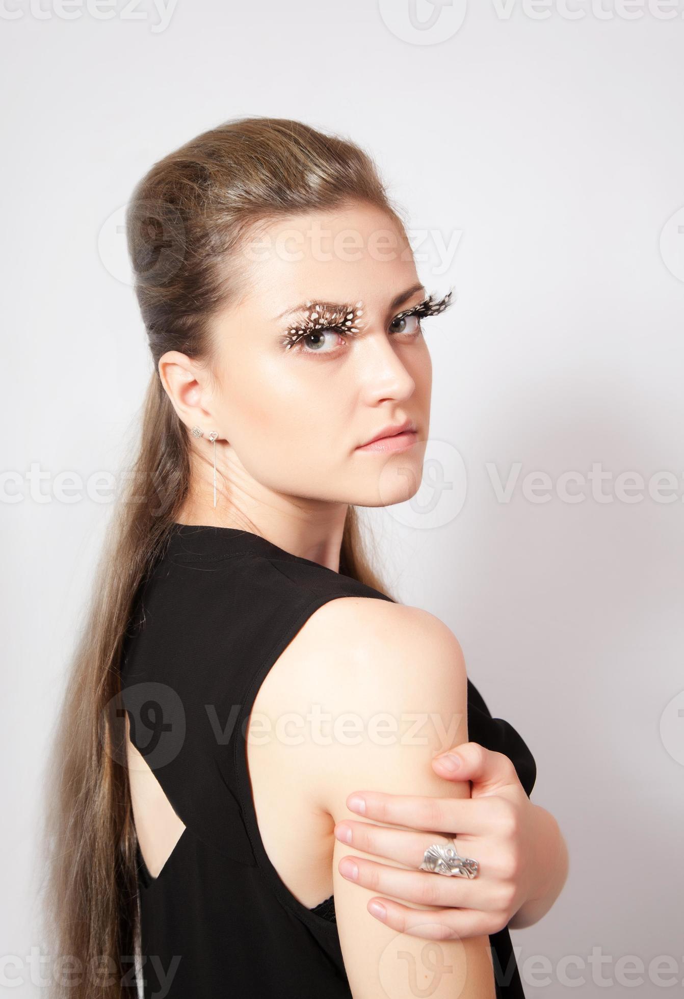 betekenis ballet Bestudeer mooie vrouw met grote wimpers en face-art 1258314 Stockfoto