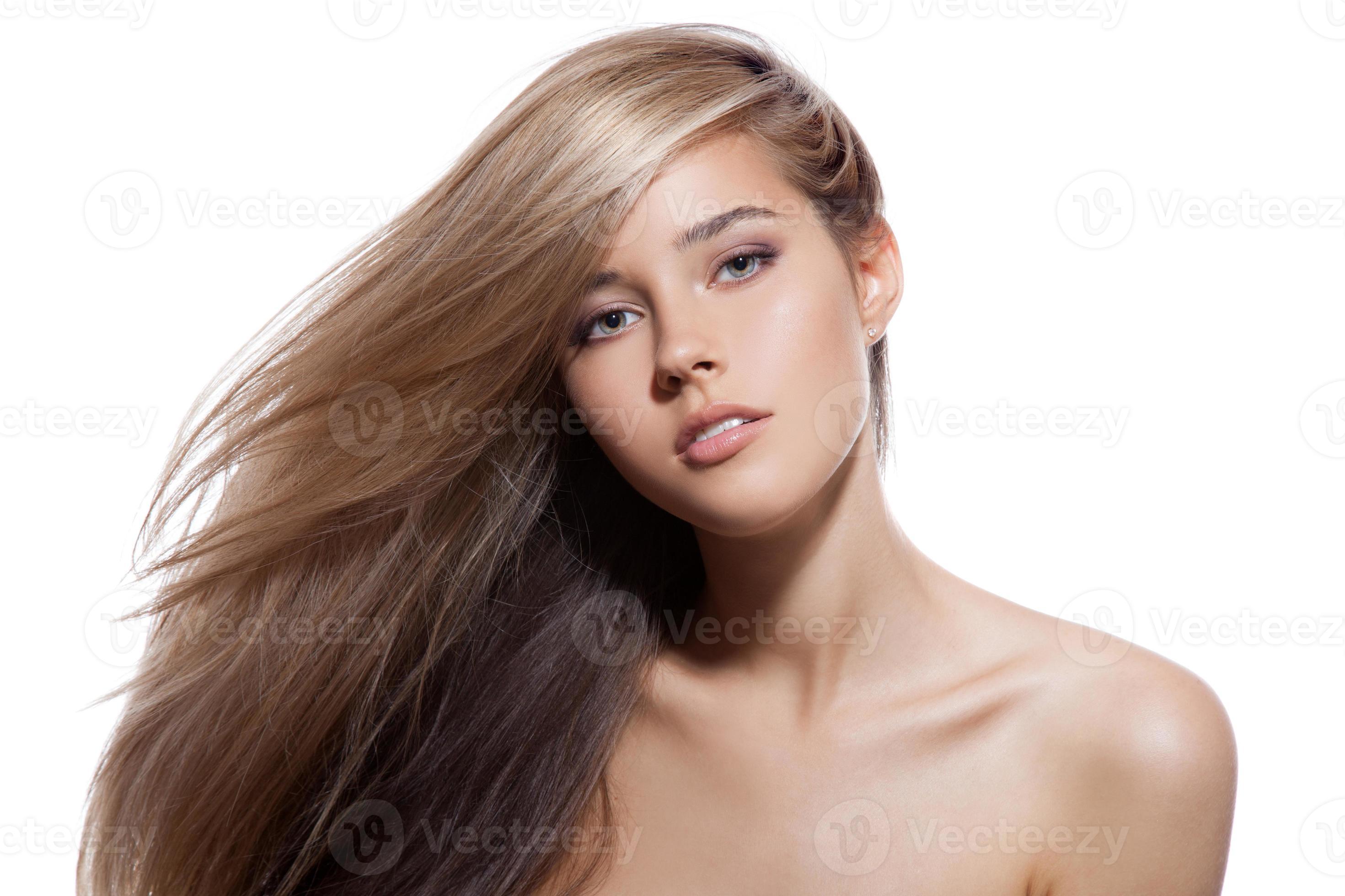 Omzet rukken eeuwig mooi blond meisje. gezond lang haar. witte achtergrond 1260053 Stockfoto