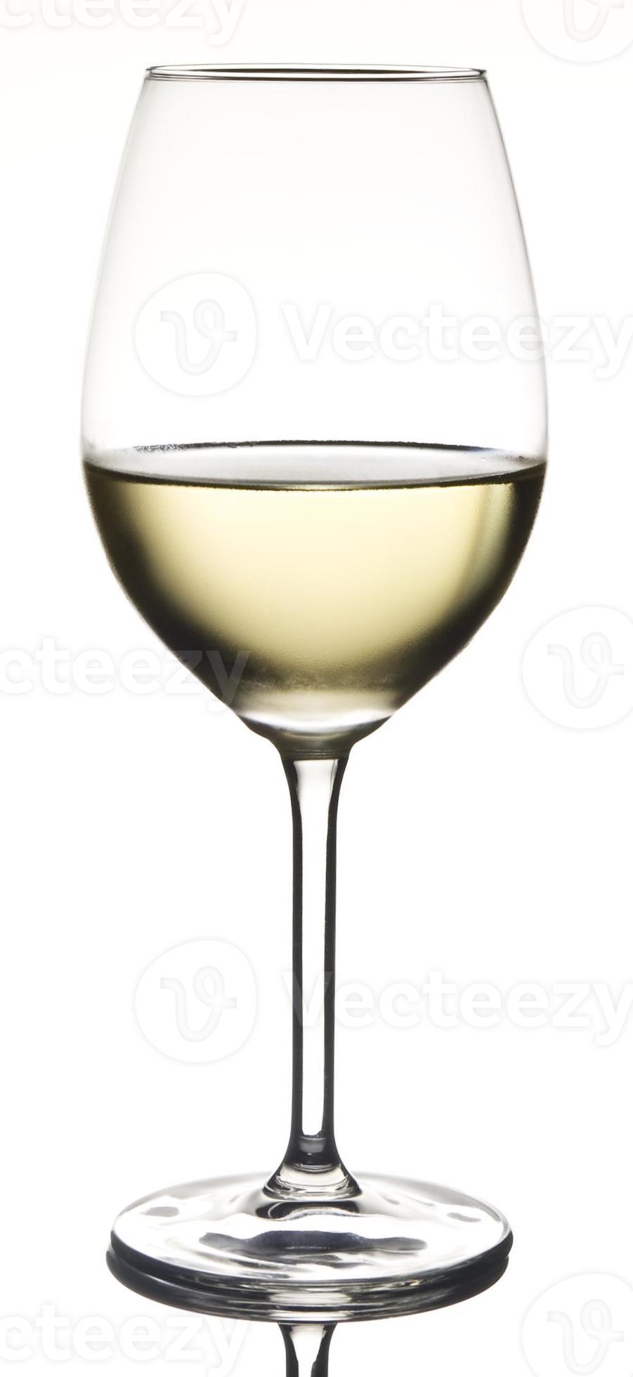 Spuug uit voor mij voeden halfvolle witte wijn in glas met condensatie 1385254 Stockfoto