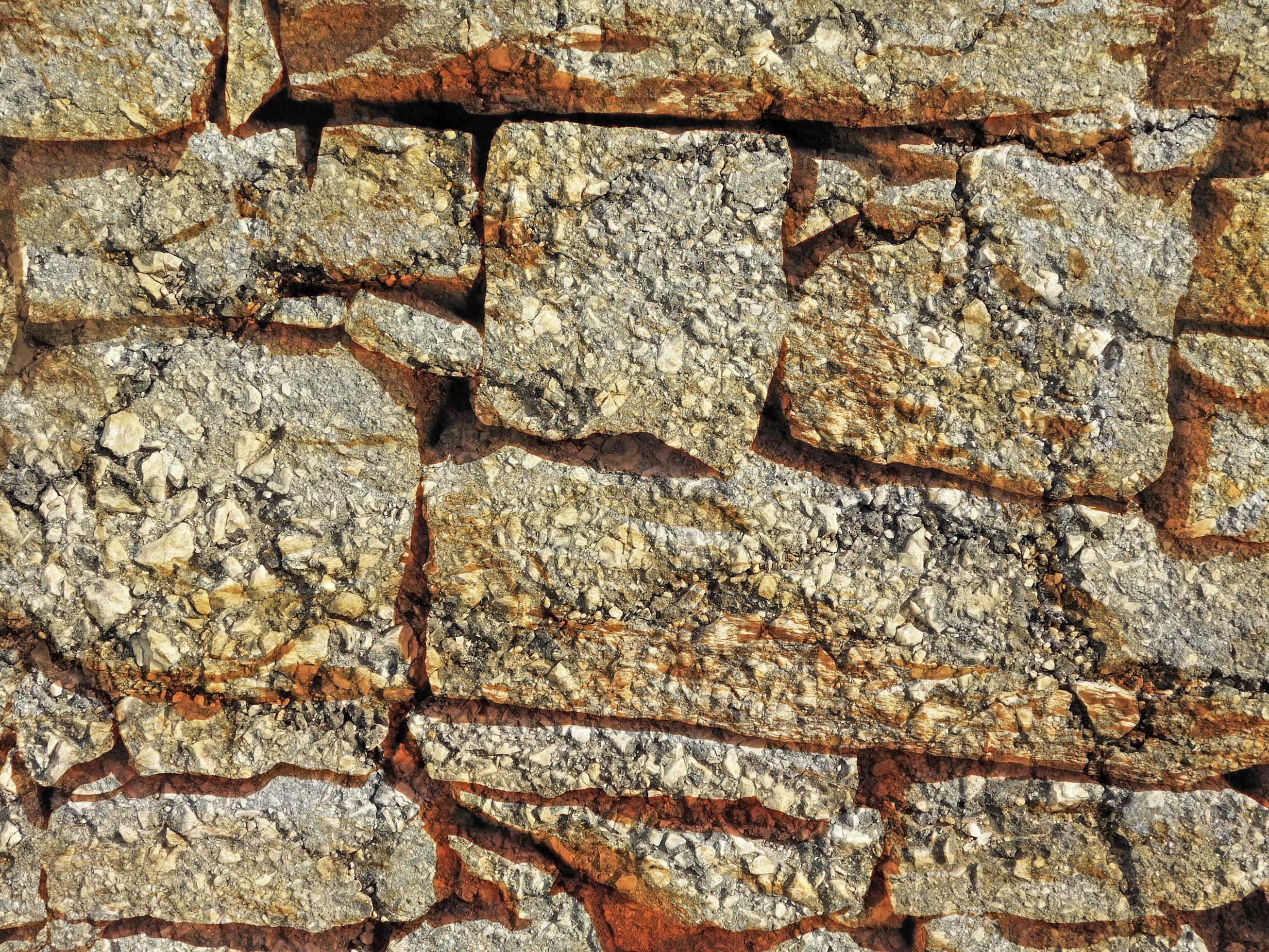detail van outdoor stenen muur voor achtergrond of textuur foto