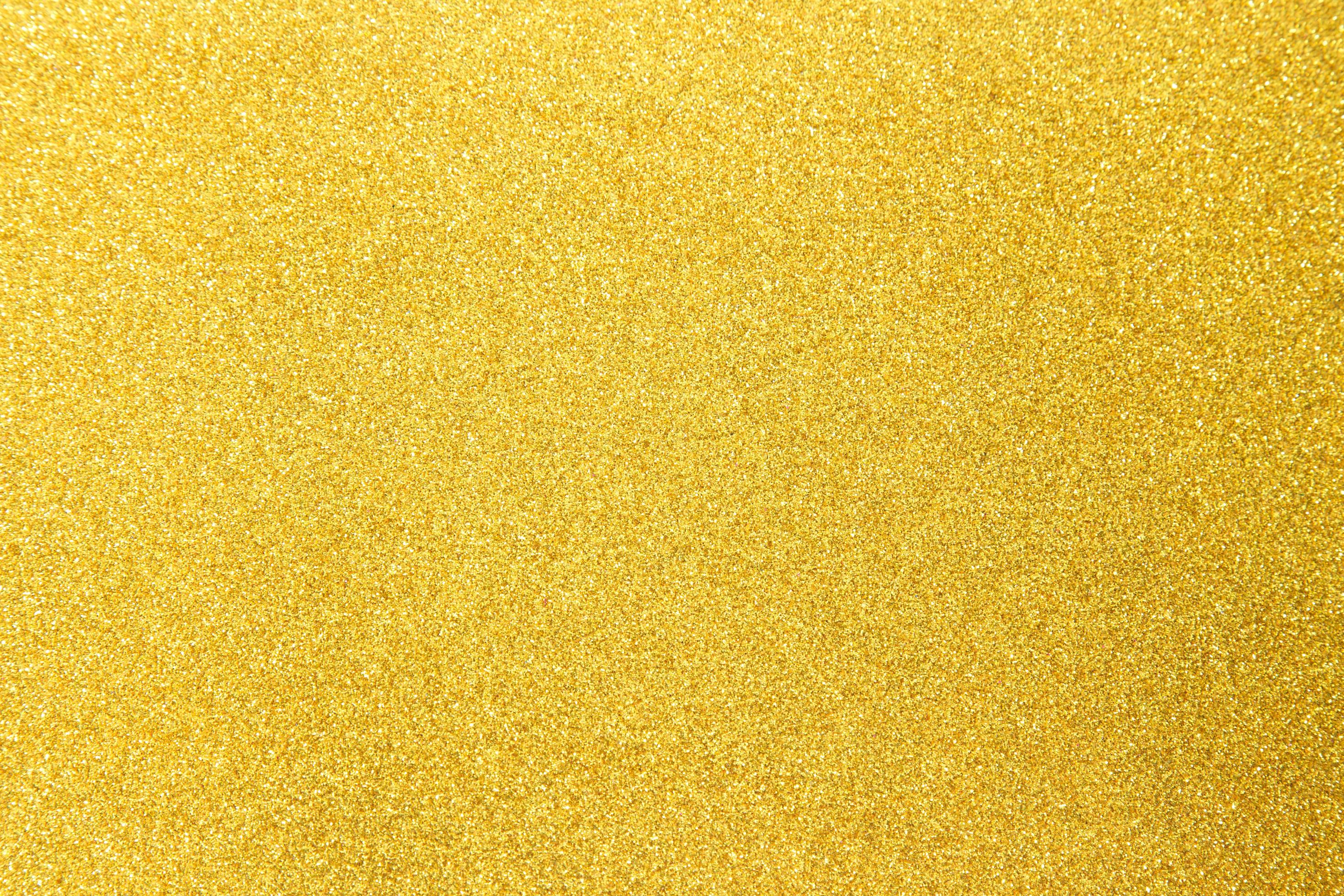 gouden glitter textuur achtergrond 2901964 stockfoto Vecteezy