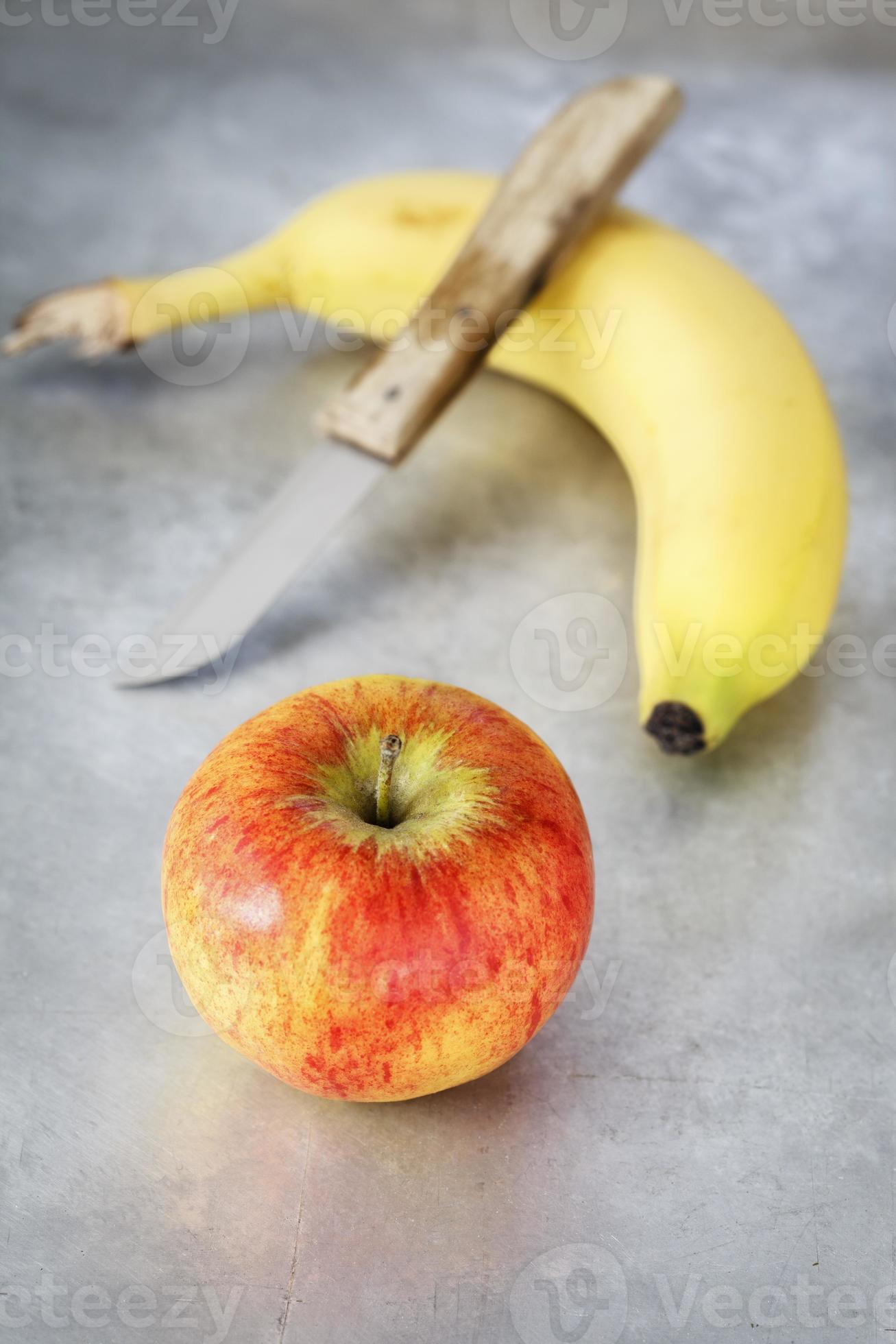 misdrijf Generator uitzending appel, banaan en mes 786466 Stockfoto