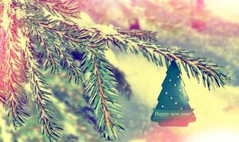 winterlandschap en kerstboom foto