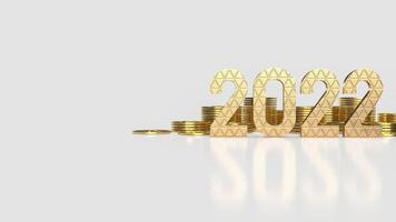 het gouden nummer 2022 en gouden munten op een witte achtergrond voor het nieuwe jaar of bedrijfsconcept 3D-rendering foto