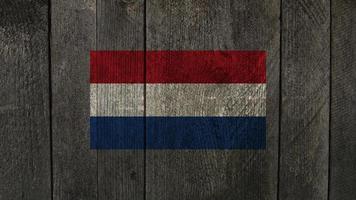nederlandse vlag. nederlandse vlag op een houten bord foto