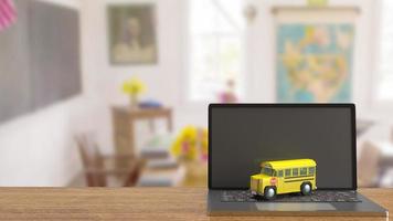 schoolbus op laptop voor e learning concept 3D-rendering foto