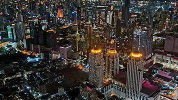 bangkok, thailand, 2022 - bangkok citiy scape at night top view from baiyok building.