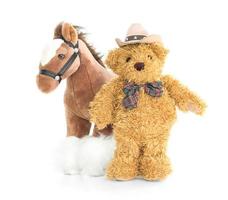 cowboy teddybeer en paard foto