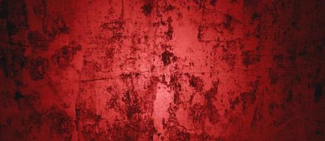 donker rode muur textuur achtergrond. halloween achtergrond eng. rode en zwarte grunge achtergrond met krassen