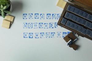 houten stempel alfabet close-up afbeelding voor achtergrond. foto