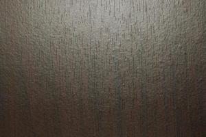 abstracte donkere textuur van mdf houten bord achtergrond. spotlight op donkere achtergrond voor uw ontwerp. foto
