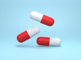 3D render, 3d illustratie. witte en rode capsulepil. geneeskunde capsules op blauwe pastel achtergrond. foto