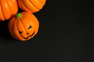 de halloween pompoen jack in zwarte vakantie achtergrondafbeelding. foto