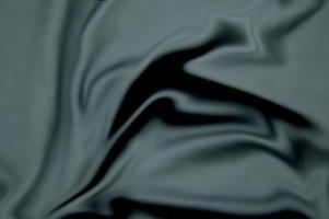 abstract vervagen Golf kromme zwart grijs kleding stof achtergrond ontwerp foto