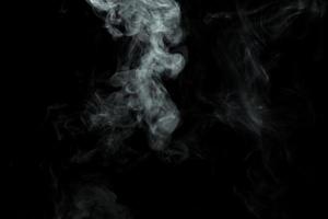 abstracte poeder of rook geïsoleerd op zwarte achtergrond foto