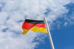 Duitse vlag golvend in de wind foto
