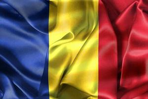 3D-illustratie van een vlag van Roemenië - realistische wapperende stoffen vlag foto