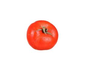 een verse rode tomaat op wit wordt geïsoleerd foto