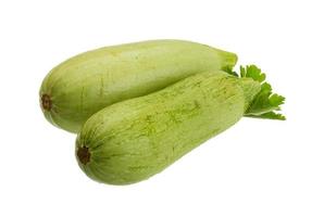 courgette op witte achtergrond foto