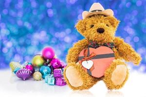 teddybeer met geschenken en ornamenten nieuwjaar foto
