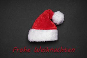 frohe weihnachten middelen vrolijk Kerstmis in Duitse foto