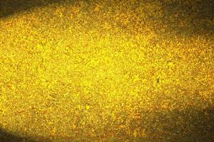 glimmend goud grond textuur, abstract achtergrond, gouden patroon foto