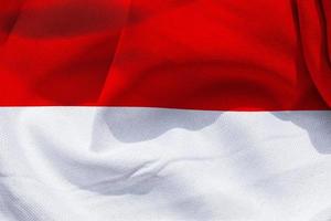 3D-illustratie van een vlag van Indonesië - realistische wapperende stoffen vlag foto