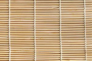structuur van houten mat gemaakt van linde stokjes foto